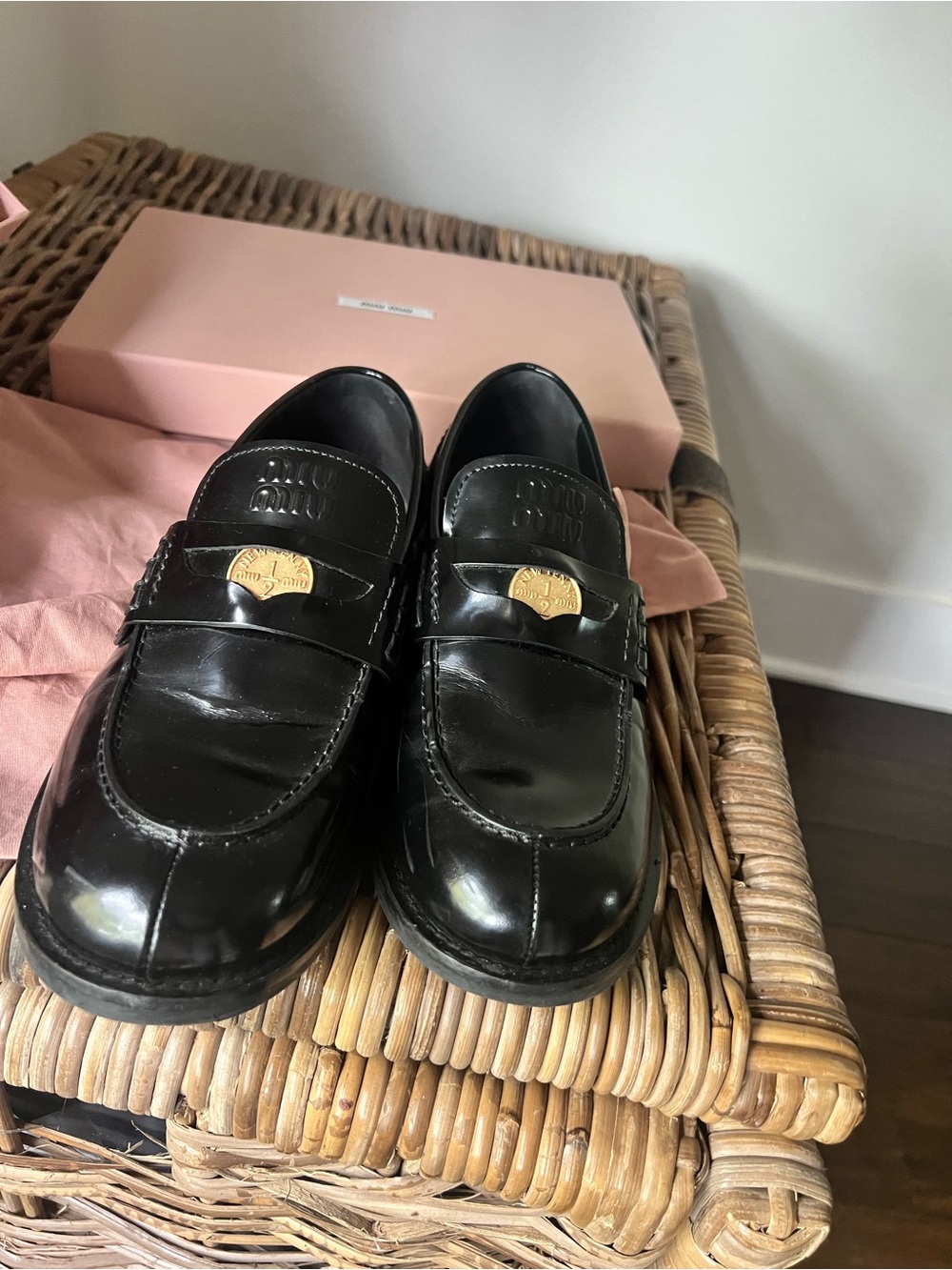 Miu Miu Black Patent Leather Loafers with Gold Plaque